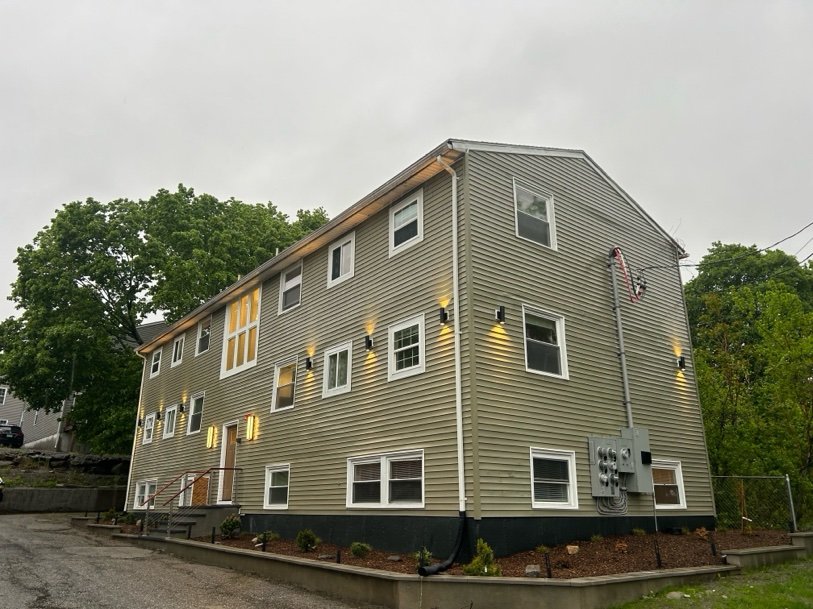 Repositioned three-story apartment building exterior